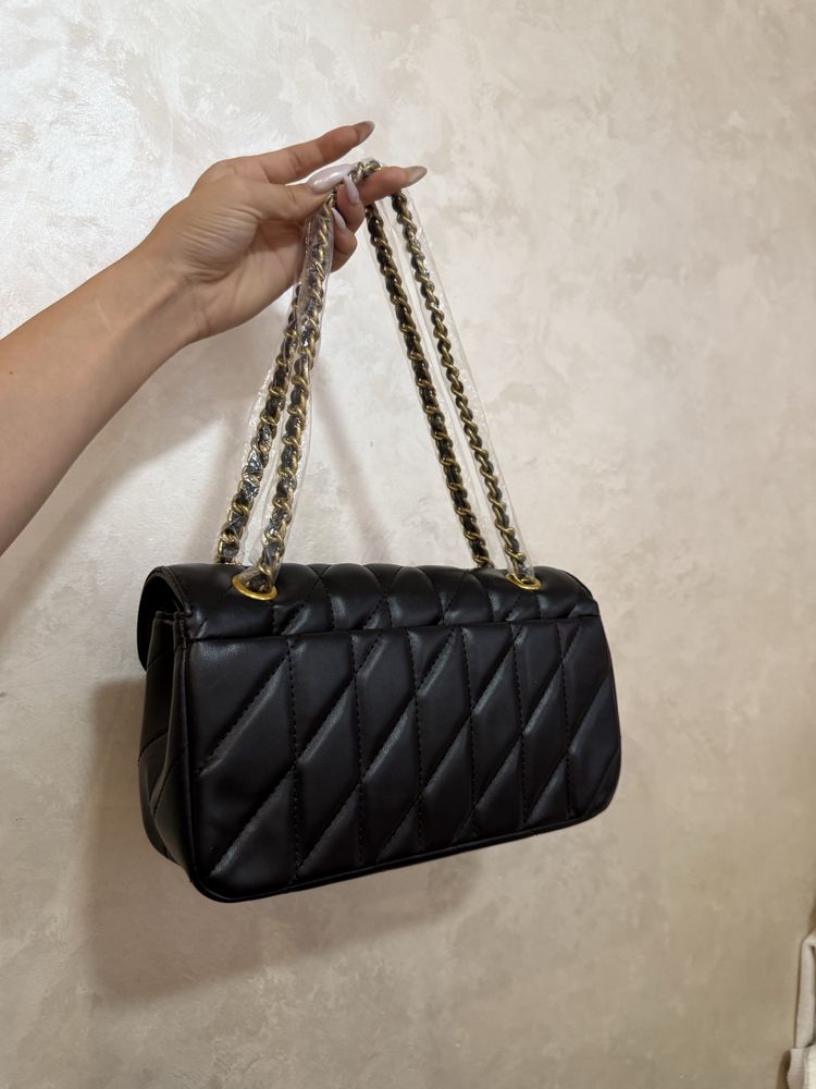 Сумка Coach.