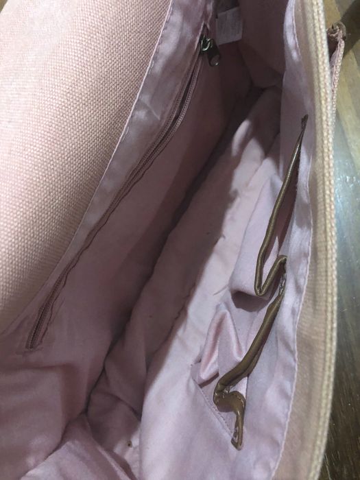 Mala mulher à tira cola