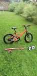 Rower Btwin pomarańczowy, hol rowerowy trail gator, kółka