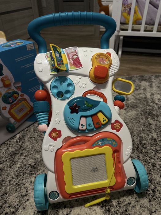 Ходунки каталка з ігровим центром