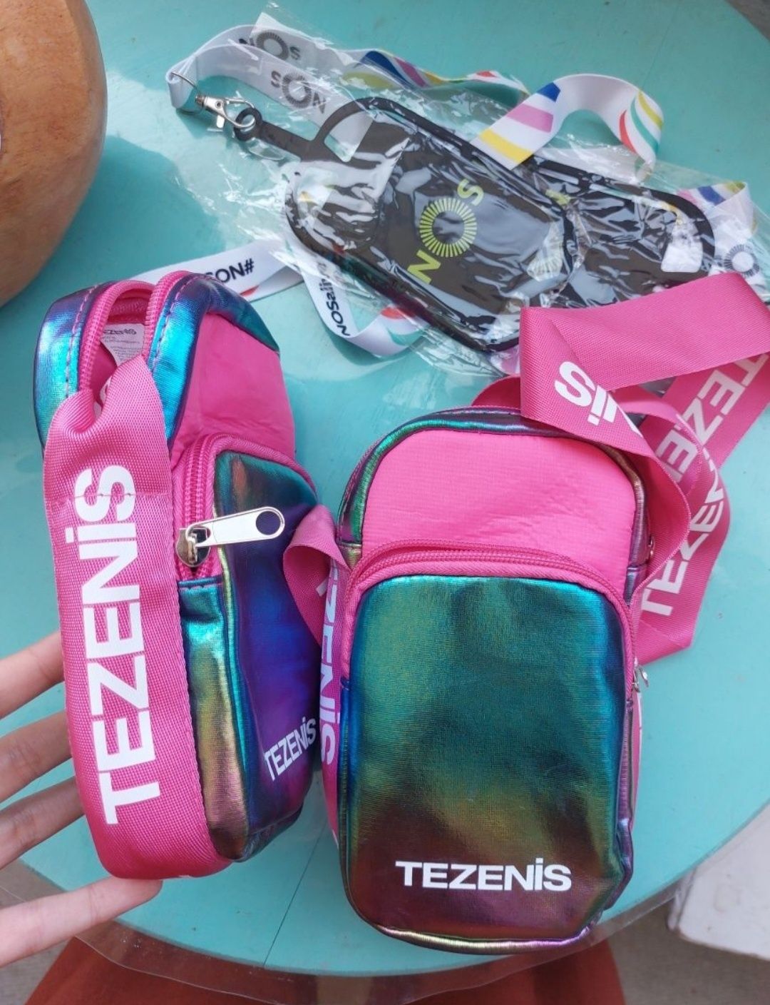 Bolsas tezenis e suportes telemóveis