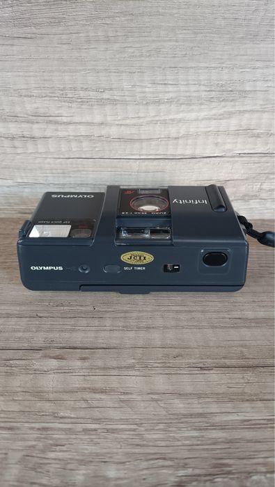 Olympus Infinity Zuiko 35mm f2.8 Japan. Компактна плівкова камера.