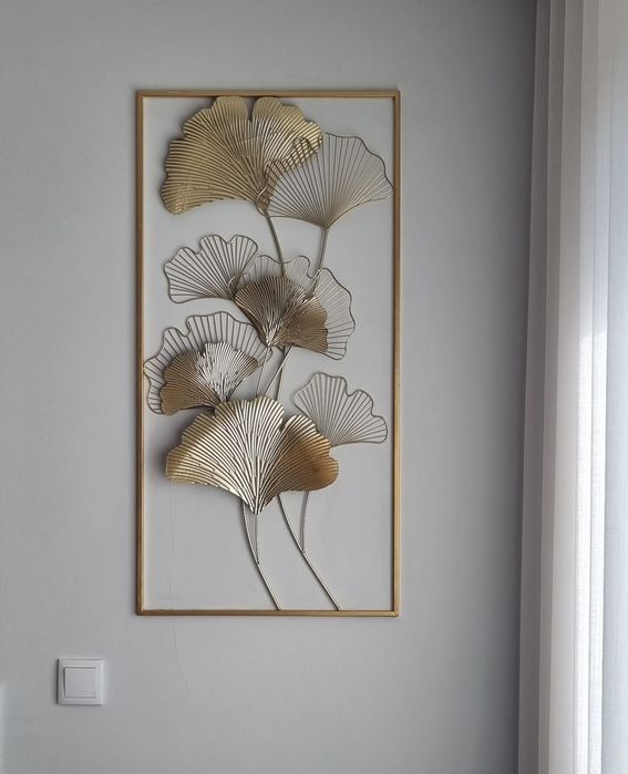 Quadro em metal dourado