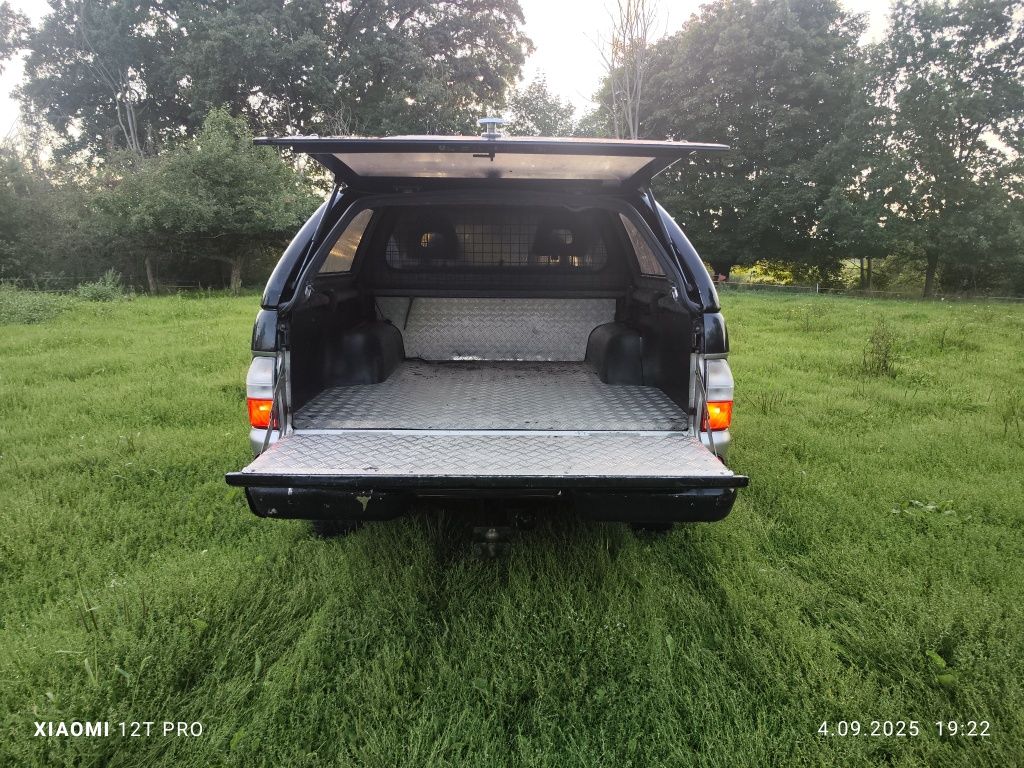 Mitsubishi L200 2.5 134 km 2004 rok przebieg 200000 km.