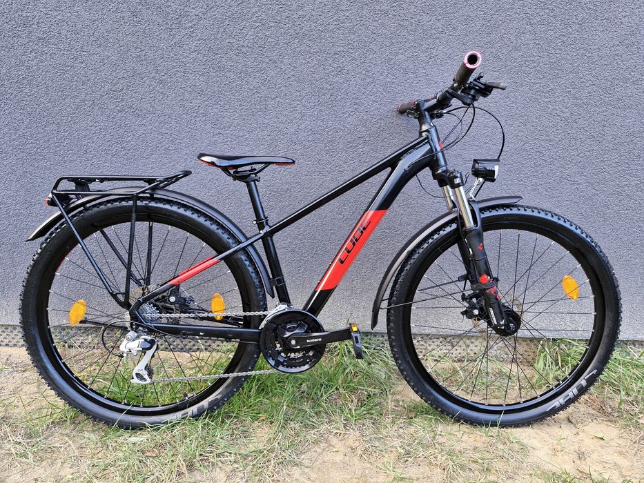 Rower Cube AIM Shimano Alivio Tarcze Suntour Oświetlenie Błotniki