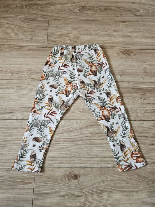 Spodnie newbie jesienne wzory lekko ocieplane liście leśne zwierzątka