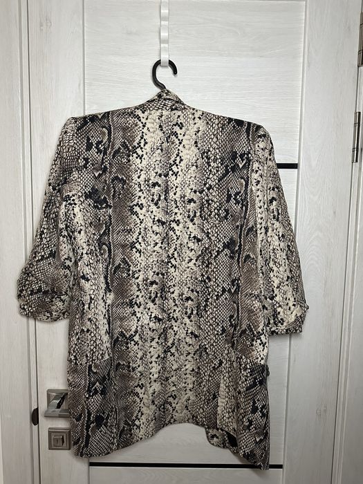 Пиджак зі скороченими рукавами