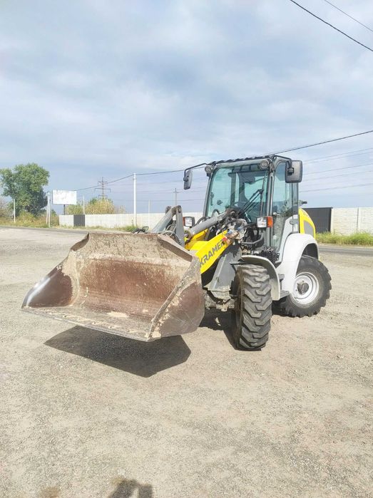 Фронтальний навантажувач KRAMER 5055. Корисний всі чотири сезони.