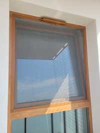 Moskitiera okienna - imitacja drewna - 101 x 107cm