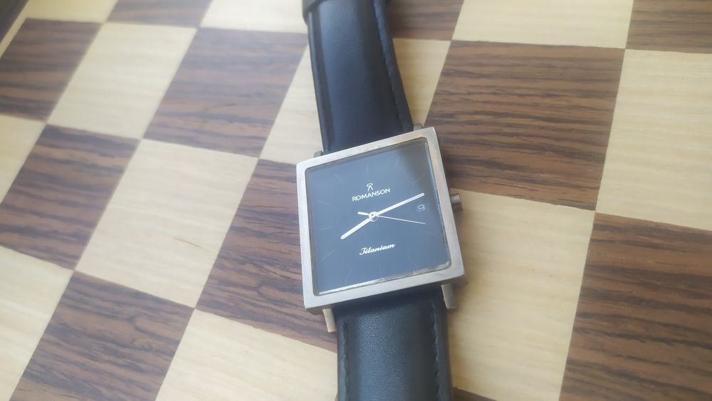 Часы ROMANSON titanium.
