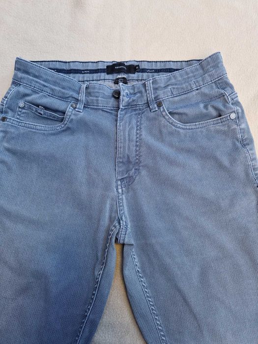 Spodnie chłopięce RESERVED rozm. 31