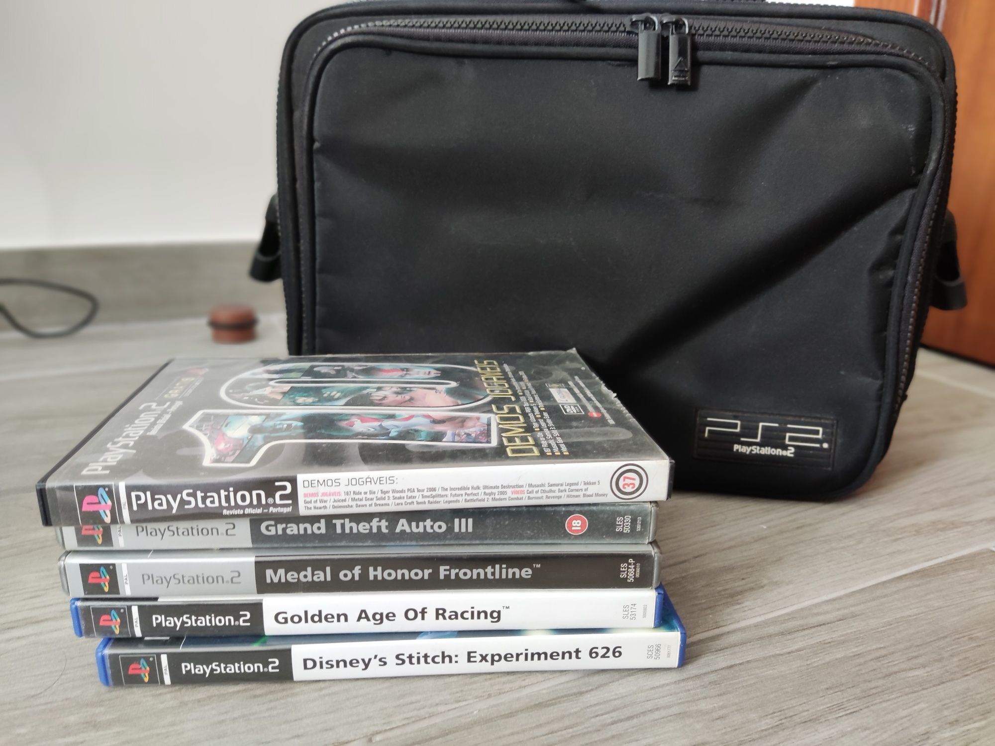 Consola slim cinza PS2+jogos e mala