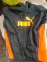 Puma: czarna zapinana na zamek bluza 128