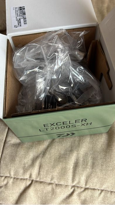 carreto daiwa exceler 2000