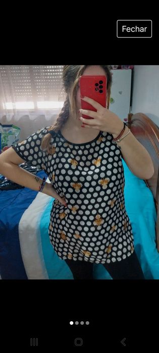 Blusa preta as bolinhas brancas tamanho M