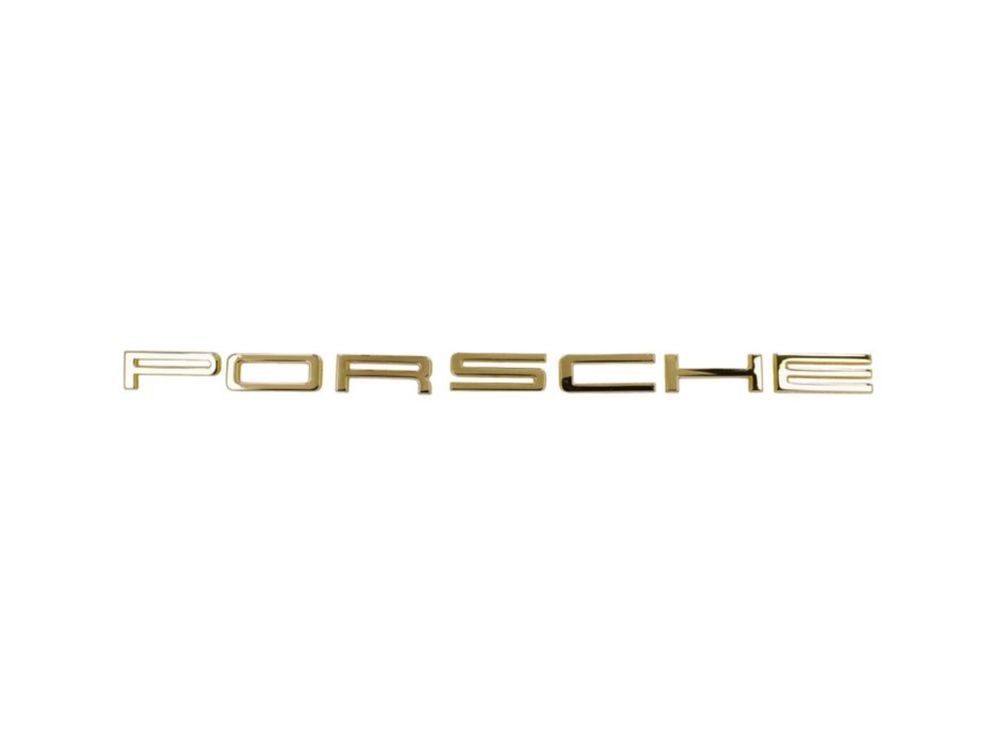 Emblema Porsche dourado