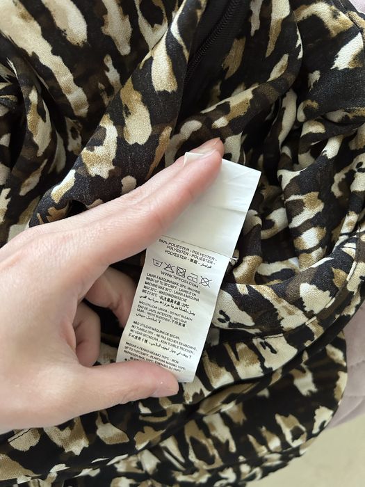 Elegancki kombinezon w panterkowy wzór, z paskiem roz L Tiffosi Woman