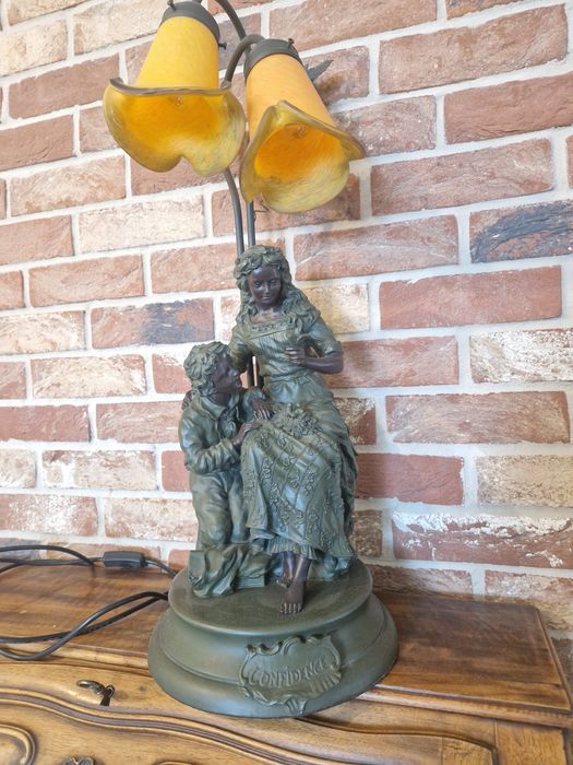 Ciężka lampa stojąca - żeliwna z motywem