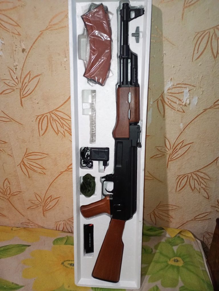 Игрушка автомат .