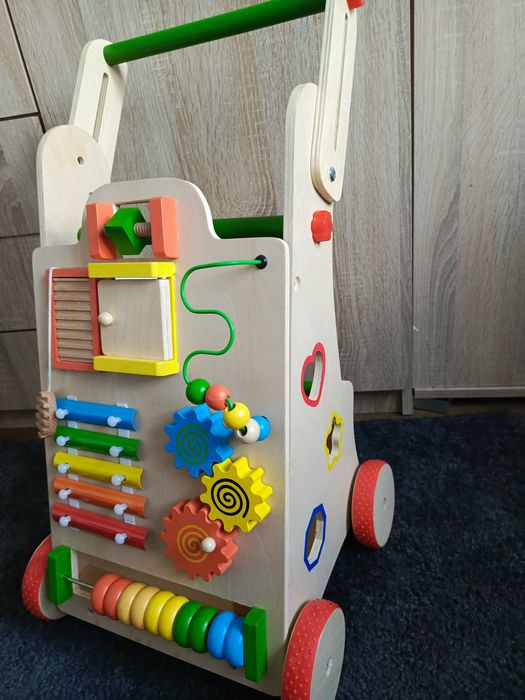 Tablica sensoryczna jeździk pchacz drewniany chodzik