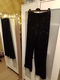 Nowe piękne długie błyszczące szerokie spodnie Sinsay r. L
