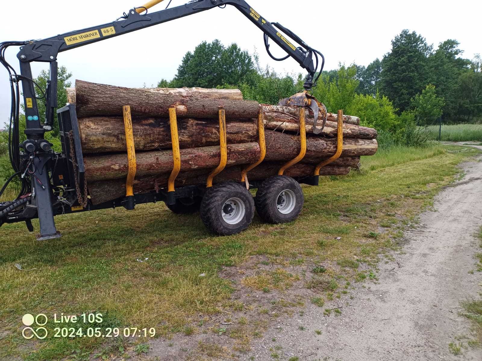 Koparko ładowarka  glebogryzarka separacyjna wycinki drzew transport .
