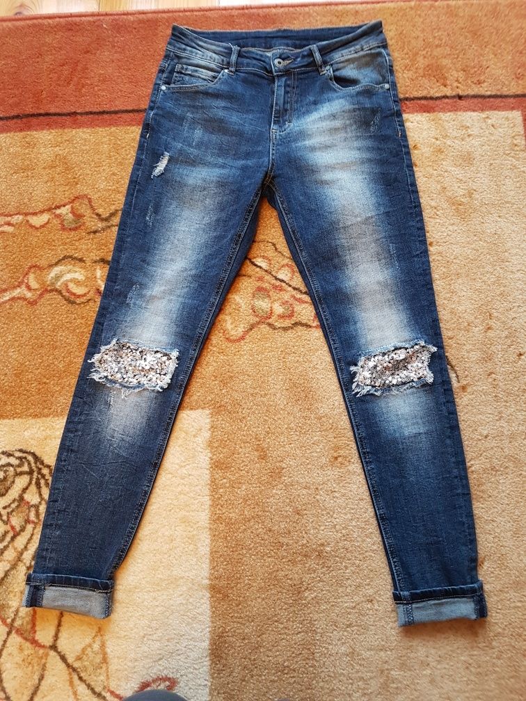 Jeansy z prztarciami roz S- M