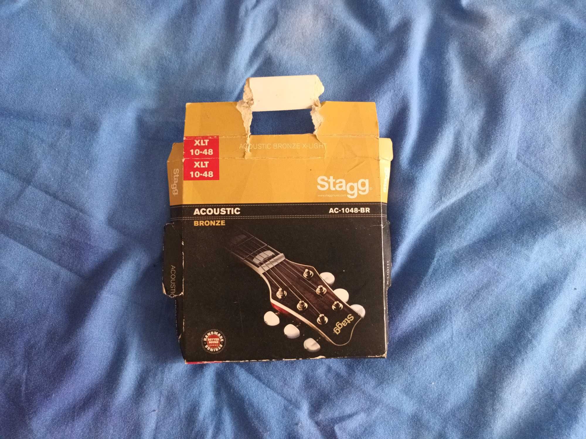 Ukulele + cordas