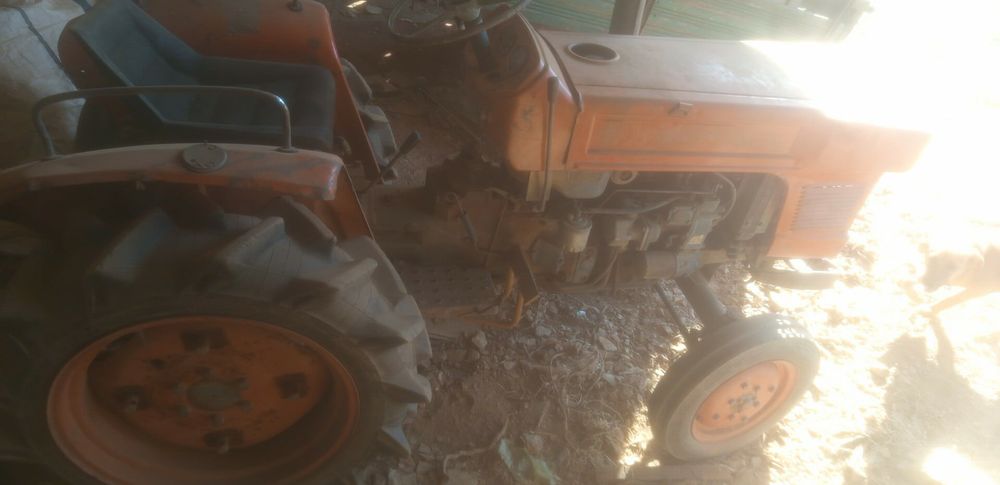 Vendo ou troco trator Kubota l1500