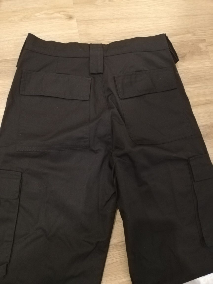Calça de trabalho multibolsos reforçadas com reflectores
