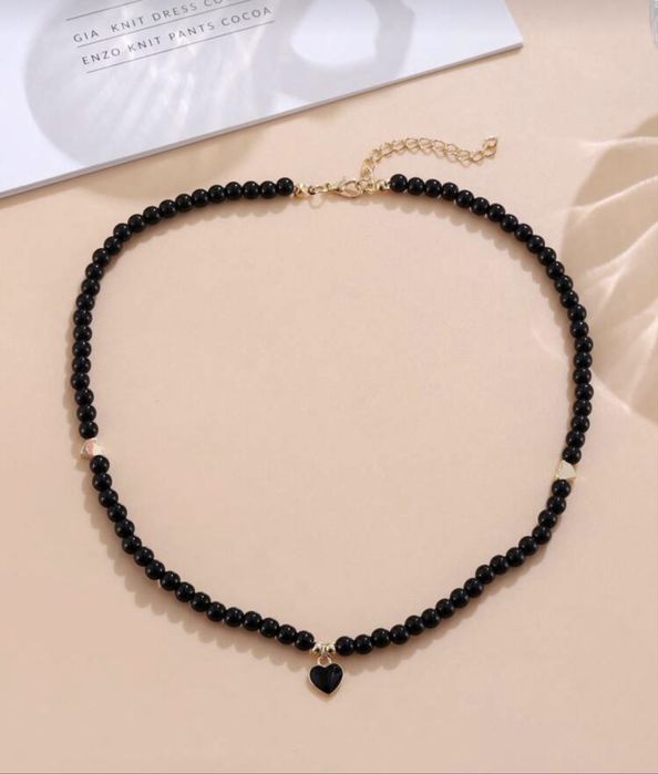 Nowy damski czarny naszyjnik z elementami złotymi