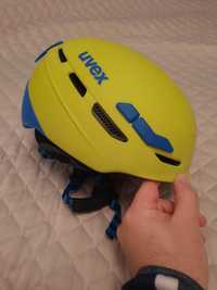 Kask juniorski Uvex zielony z niebieskimi dodatkami - rozmiar 55-59 cm