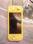 Nintendo switch lite + zelda breath of the wild