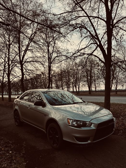 Mitsubishi lancer х 10.   1.5 газ/бензин