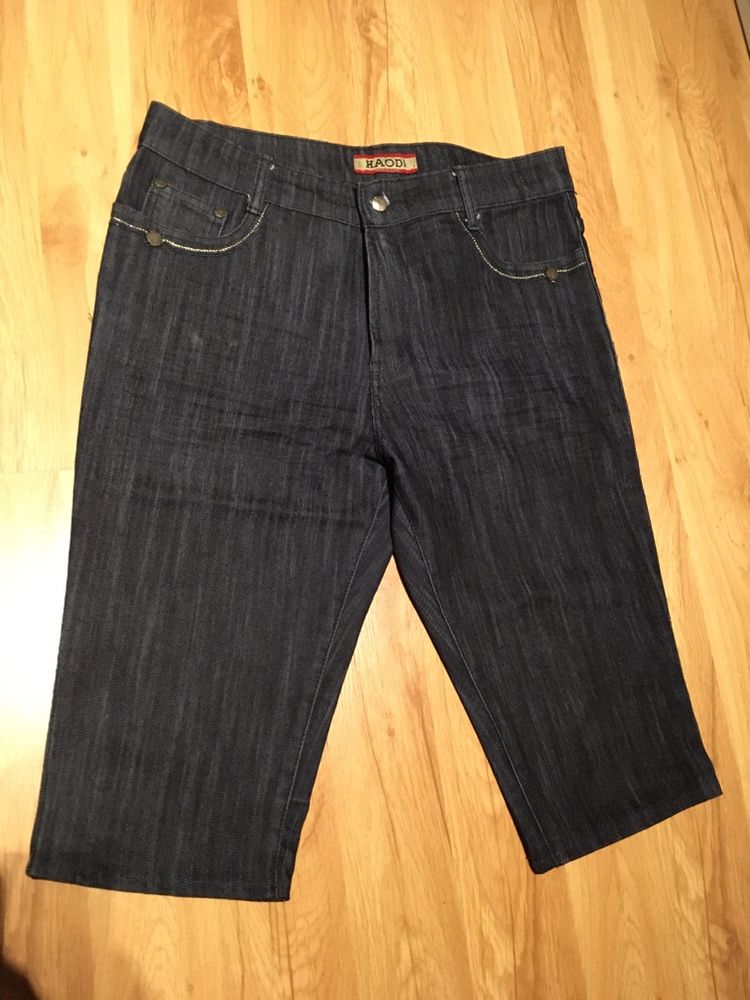 Spodnie jeans przed kolano r. 42