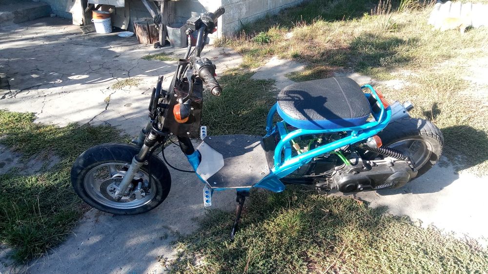 Продам  Хонда рукус 4т не саморобка кроме переда и бака