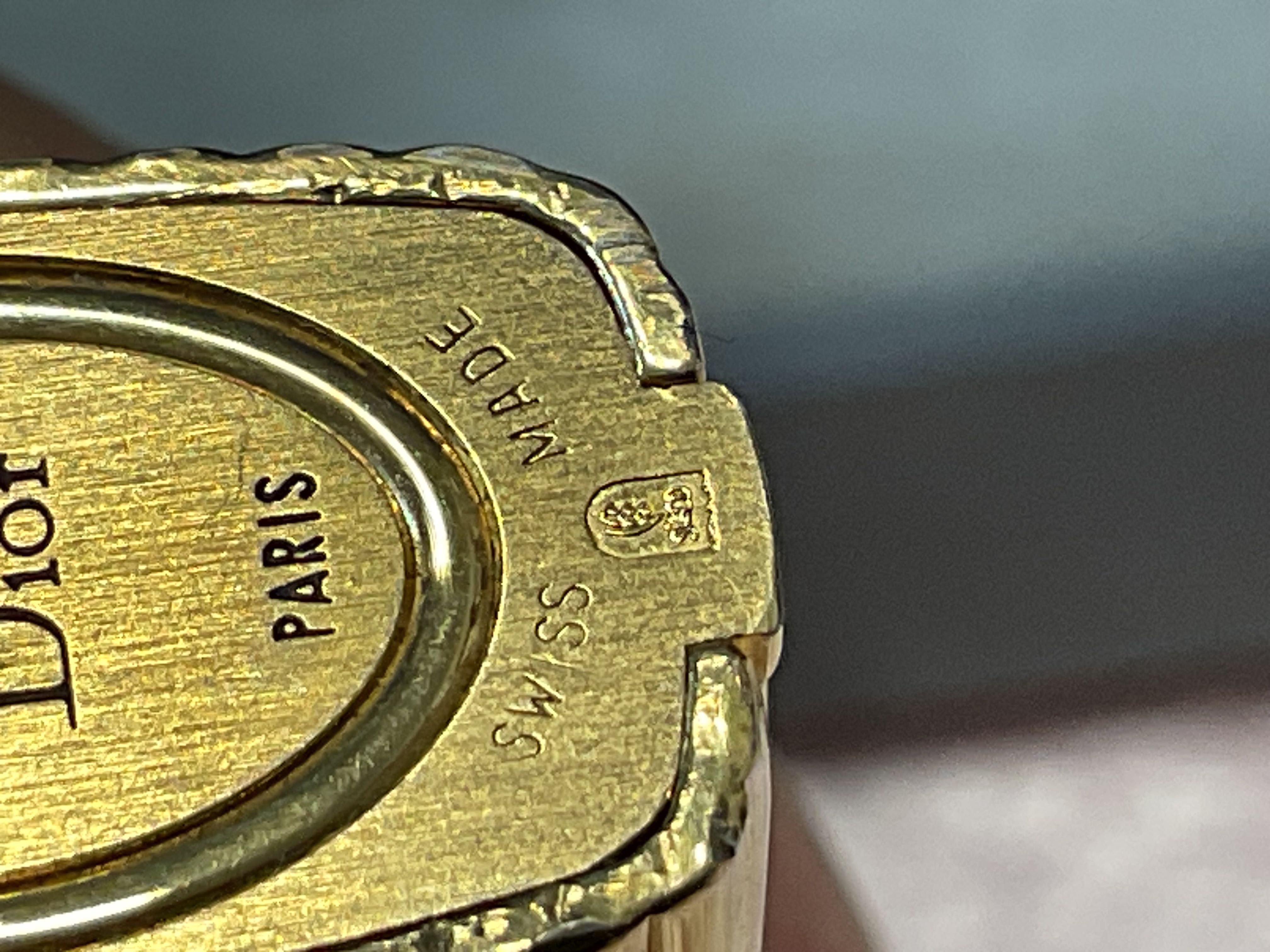 Isqueiro Christian Dior ,discrição abaixo