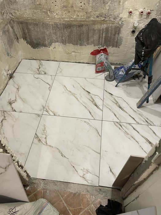 Шпаклівка,укладання плитки,ламінату