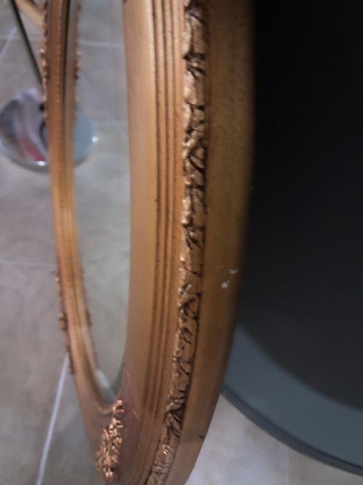 Espelho de parede dourado