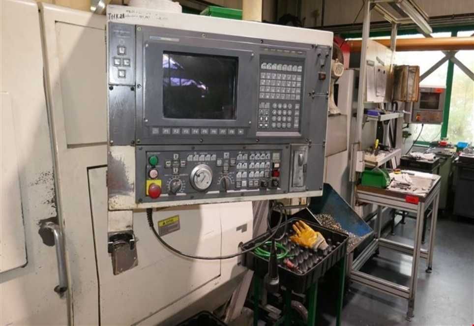 Токарний з ЧПУ Okuma  LU 15, 2000 рік, рухомий люнет, двохканальний