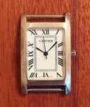клон электронных часов Cartier в корпусе из нержавеющей стали.