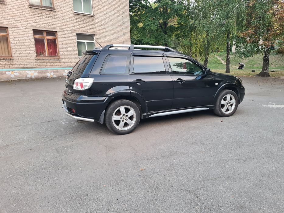 Mitsubishi outlander 2.4 avtomat
