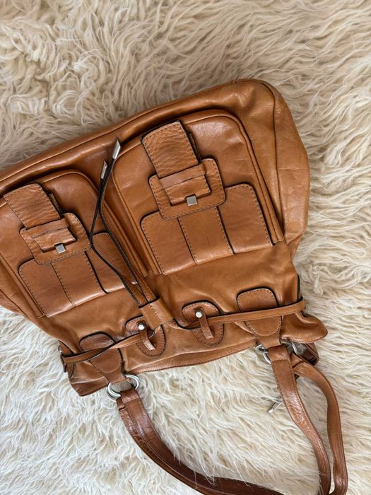 Skórzana pojemna torba z dużą ilością przegródek