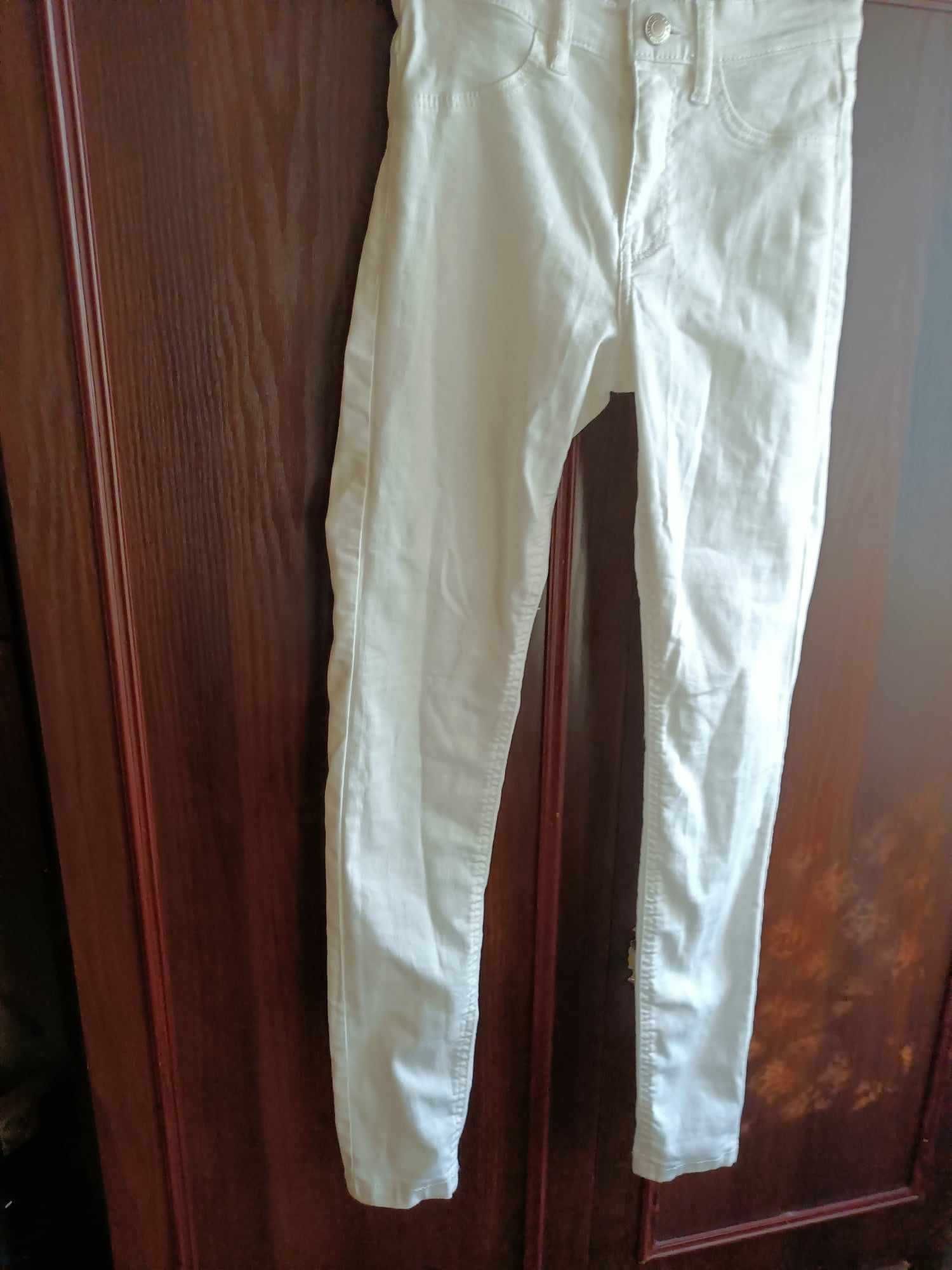Sprzedam spodnie białe roz 34 dżinsowe -nowe