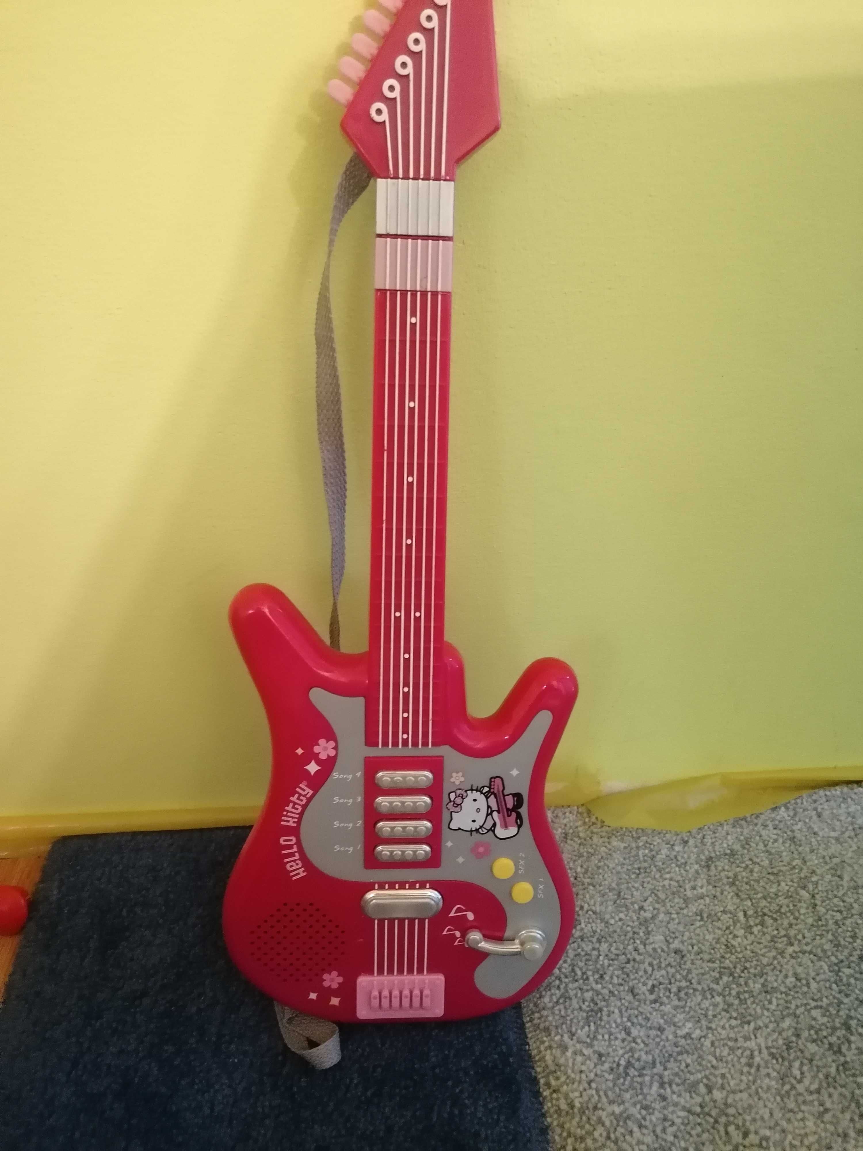 Różowa  grająca różne melodie gitara