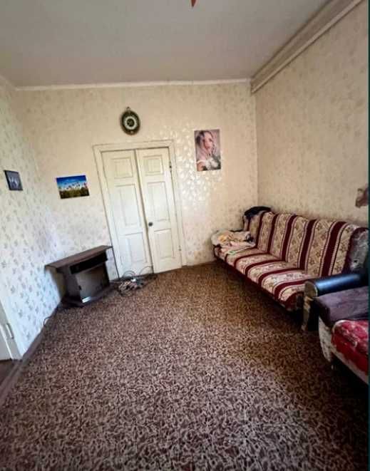 Продам кирпичный Дом на поселке  Строителей в городе Каменское.