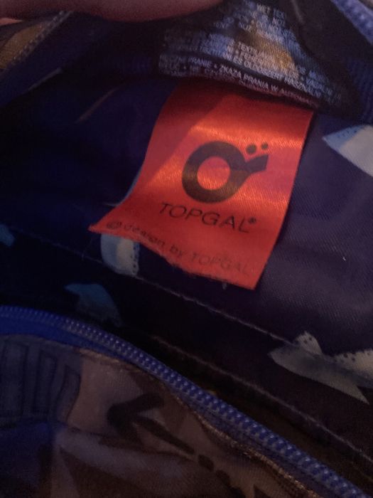 Plecak szkolny Topgal niebieski w strzałki, pojemny 4 komory