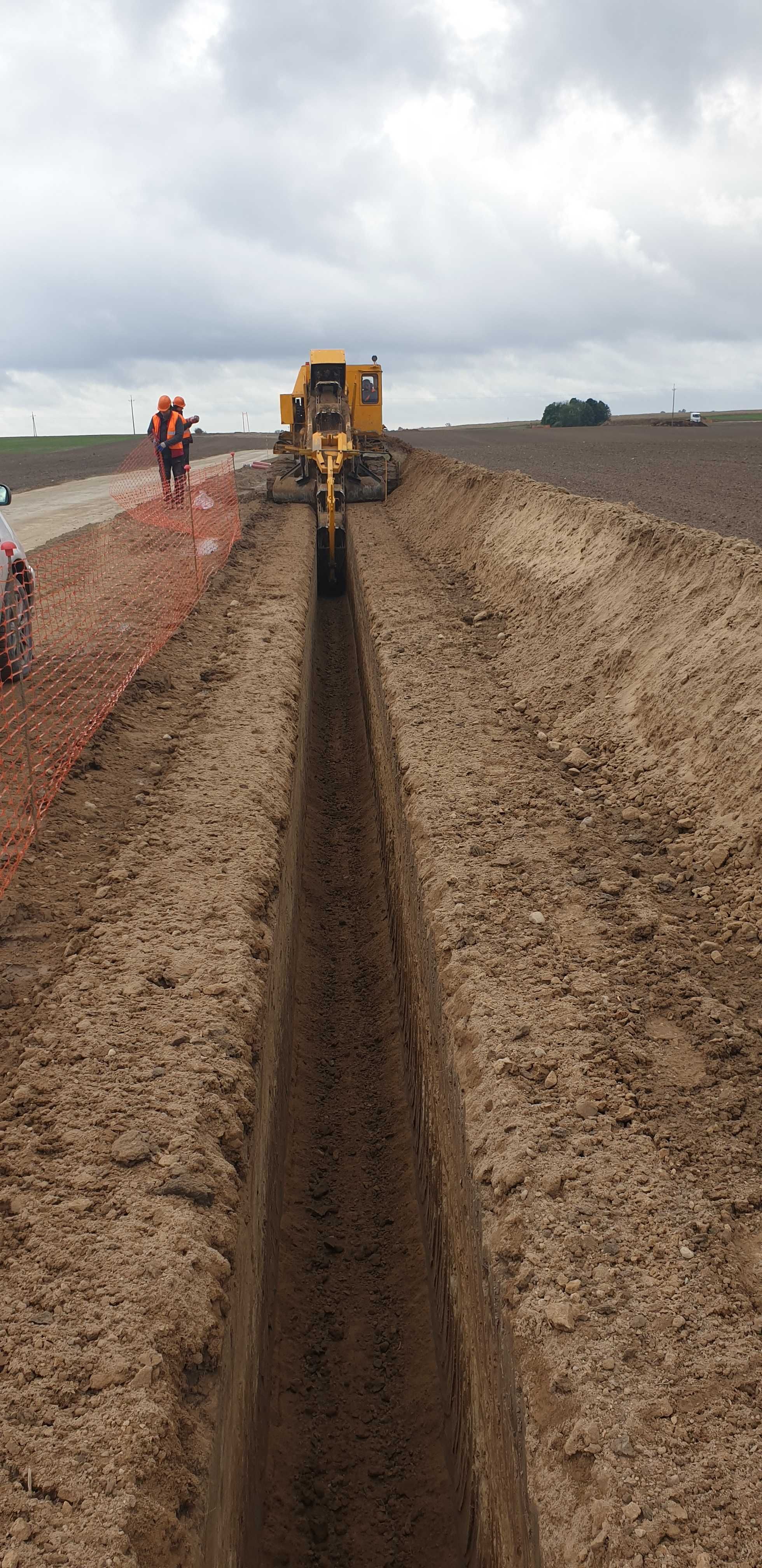 Usługi koparką łańcuchową wykopy liniowe, gaz prąd woda drenaż