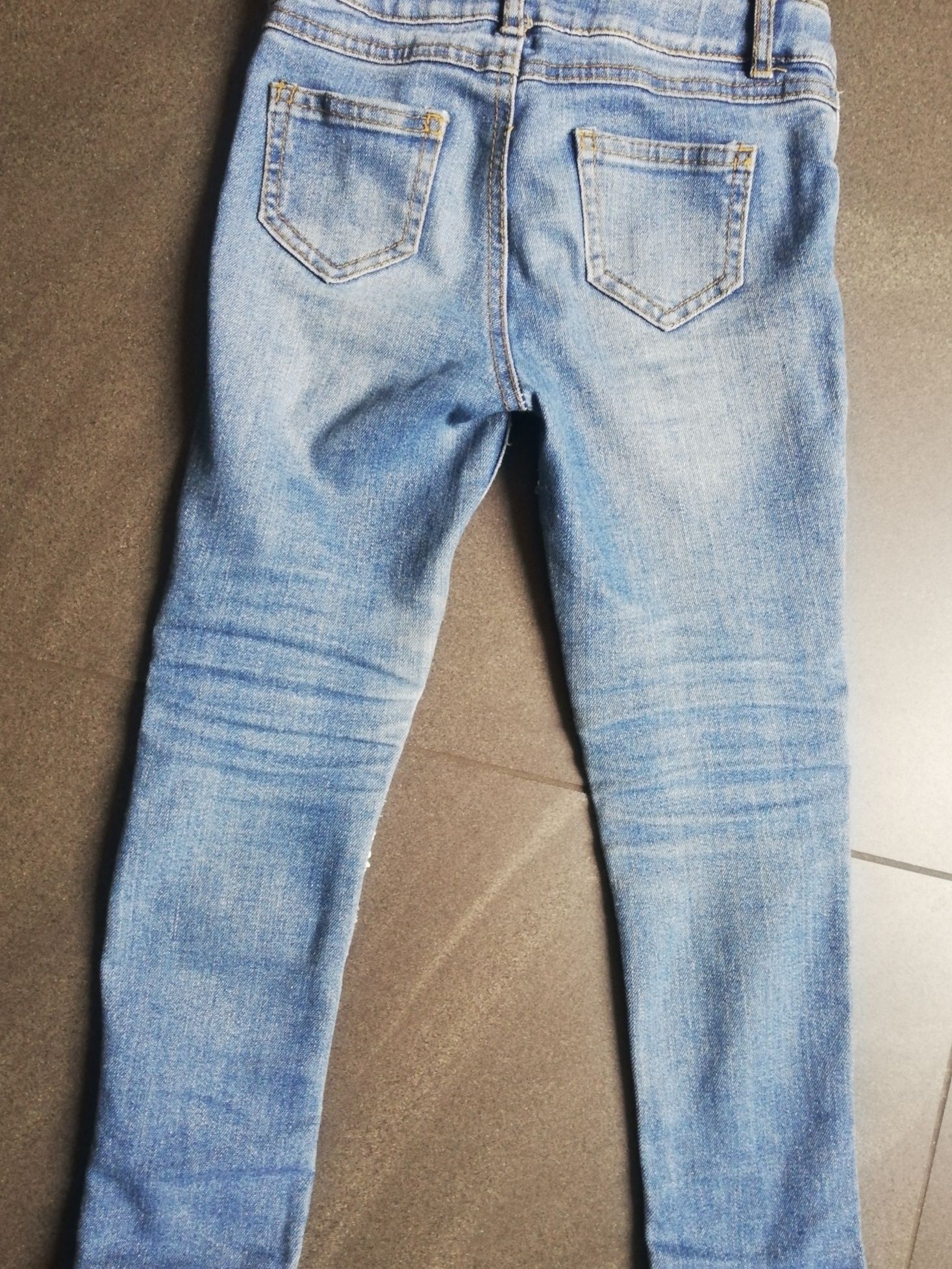 Spodnie jeansy z cekinami 116cm