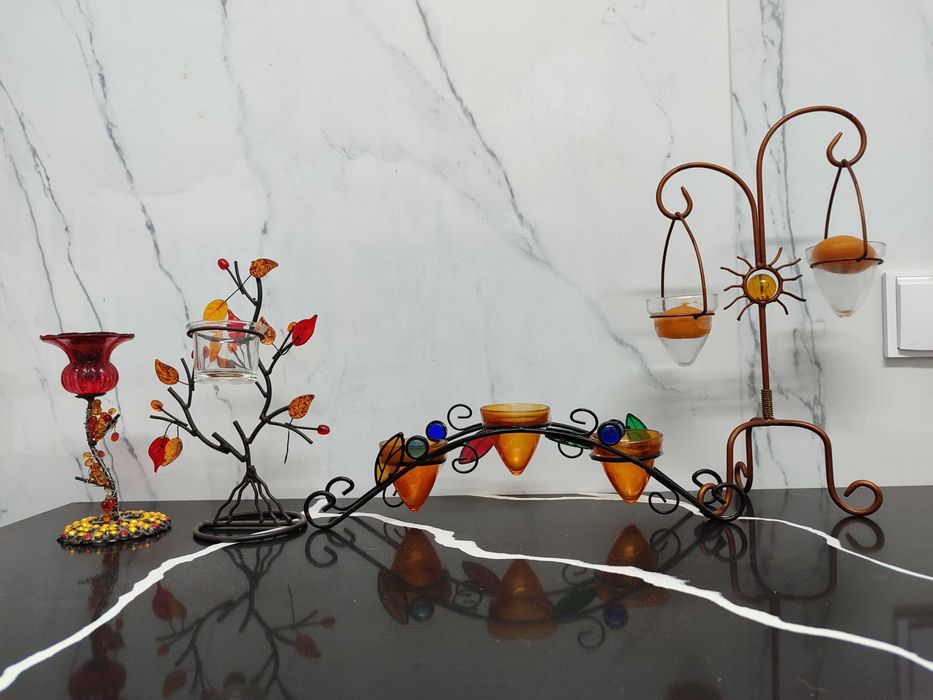 4 castiçais/porta velas